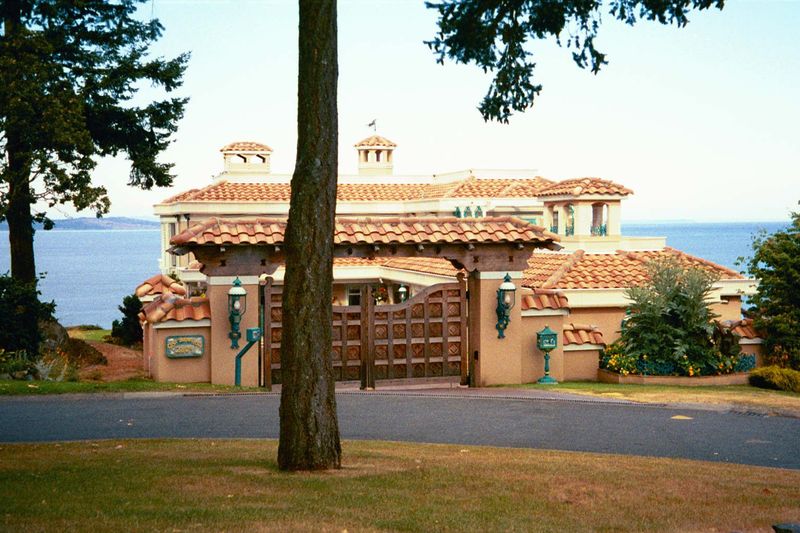 A Mediterranean villa on Ten Mile Point. The gate adds insult to injury.