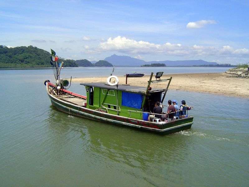 A boat heads out to sea.