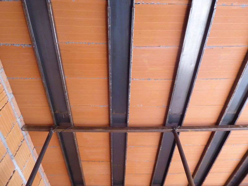 Steel joists with temporary supports.