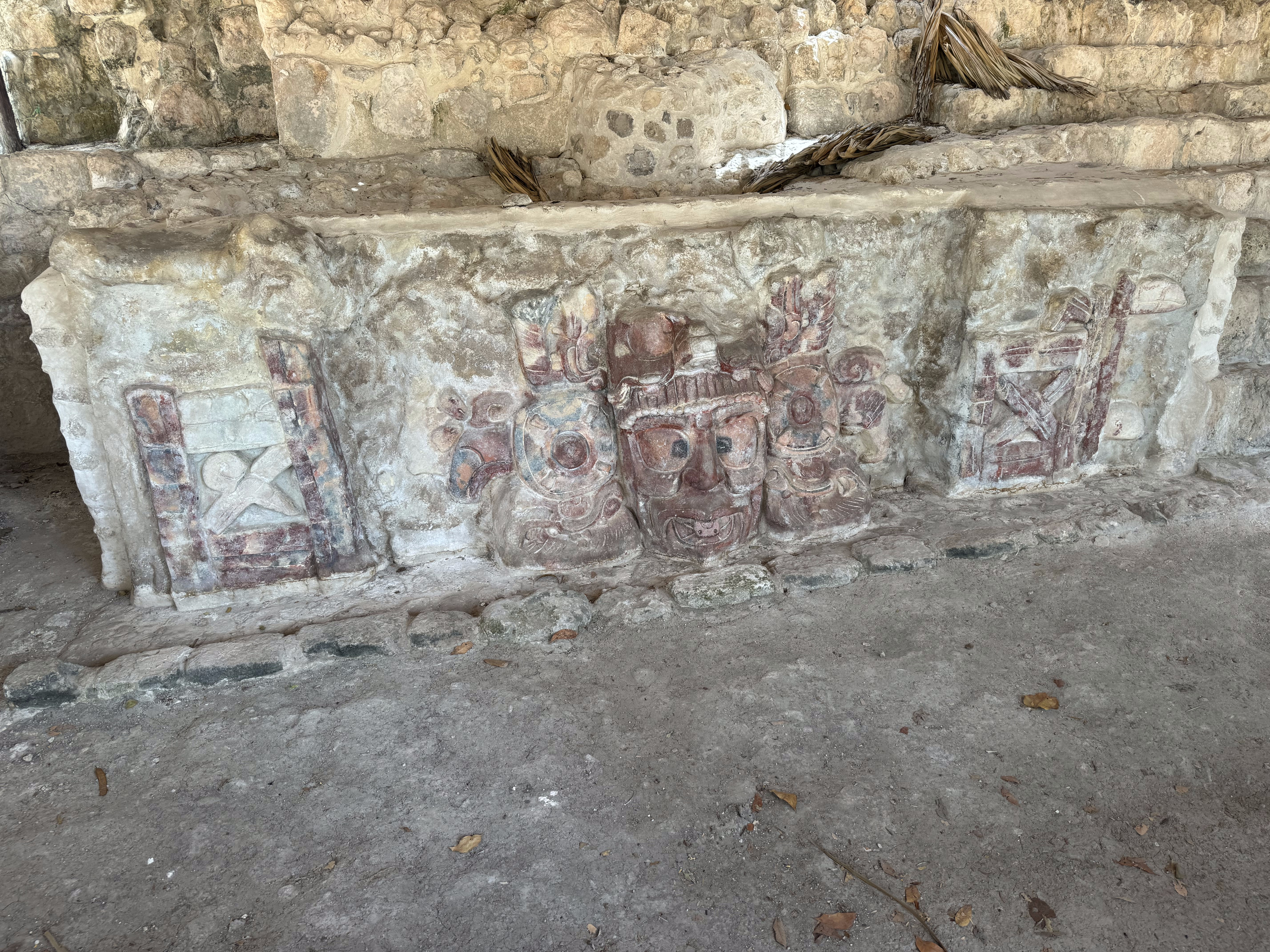 The T-shaped tooth is the god's identifying marker.