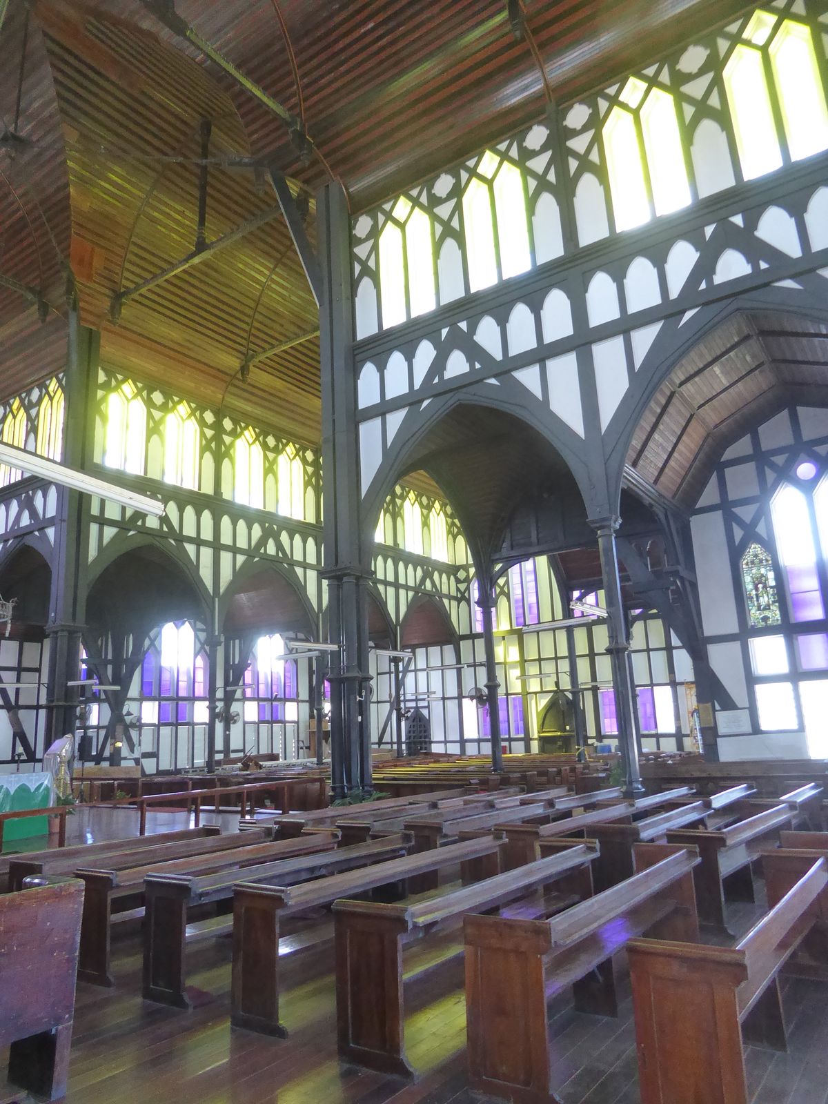 The architect, Arthur Blomfield, never visited British Guiana and only reluctantly agreed to build with wood.