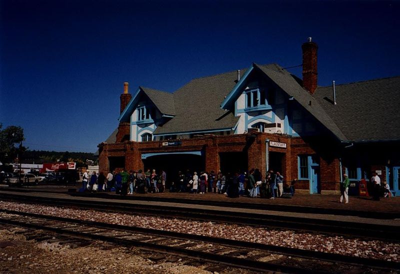 A railroad station in Arizona with dozens of waiting passengers. And this in the 1990s, not the 1940s. Explanation: Amtrak stops here for pa