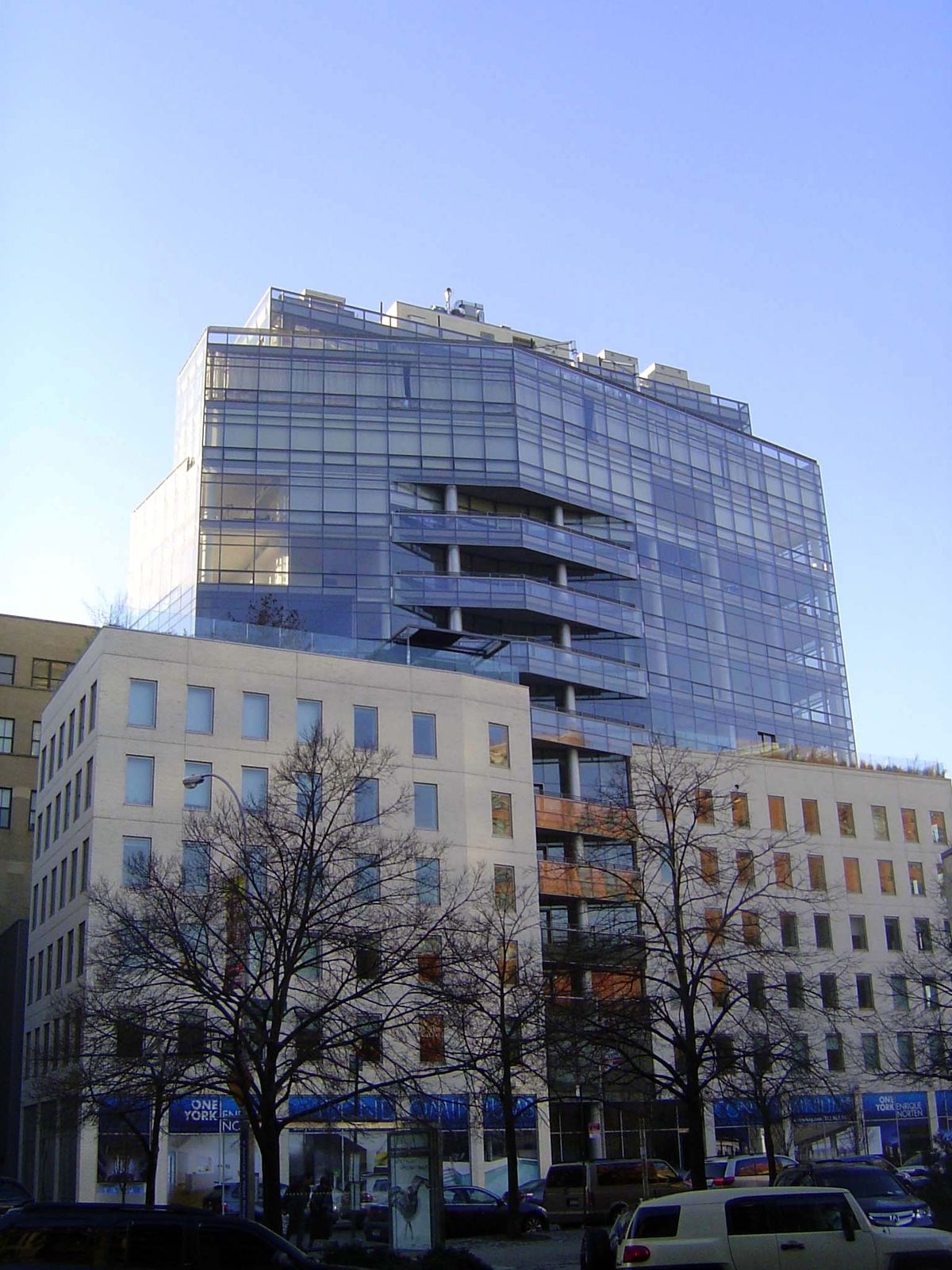On Canal street west of Broadway, Enrique Norten's Tribeca chrysalis at 1 York Street presents a new building growing out of older ones.
