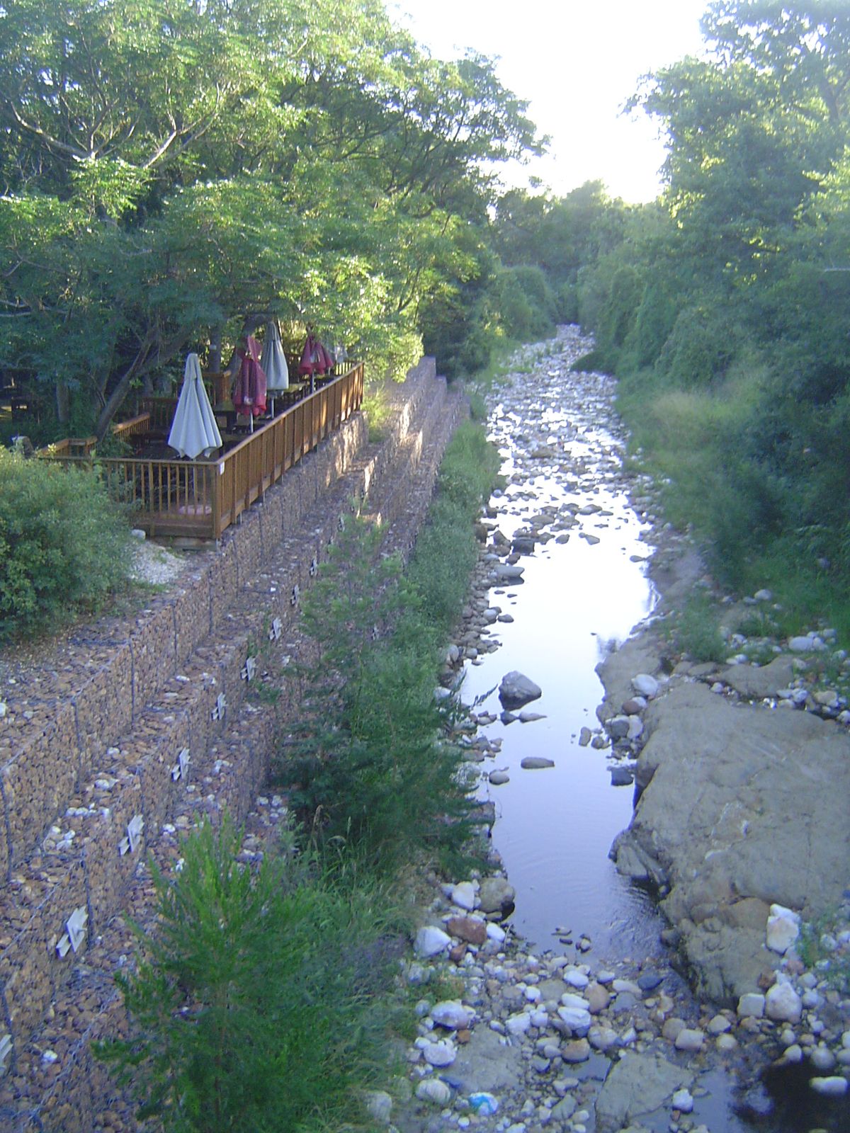 It sits on a highly engineered creek, its bank tamed by gabions. It's that Dutch heritage again!