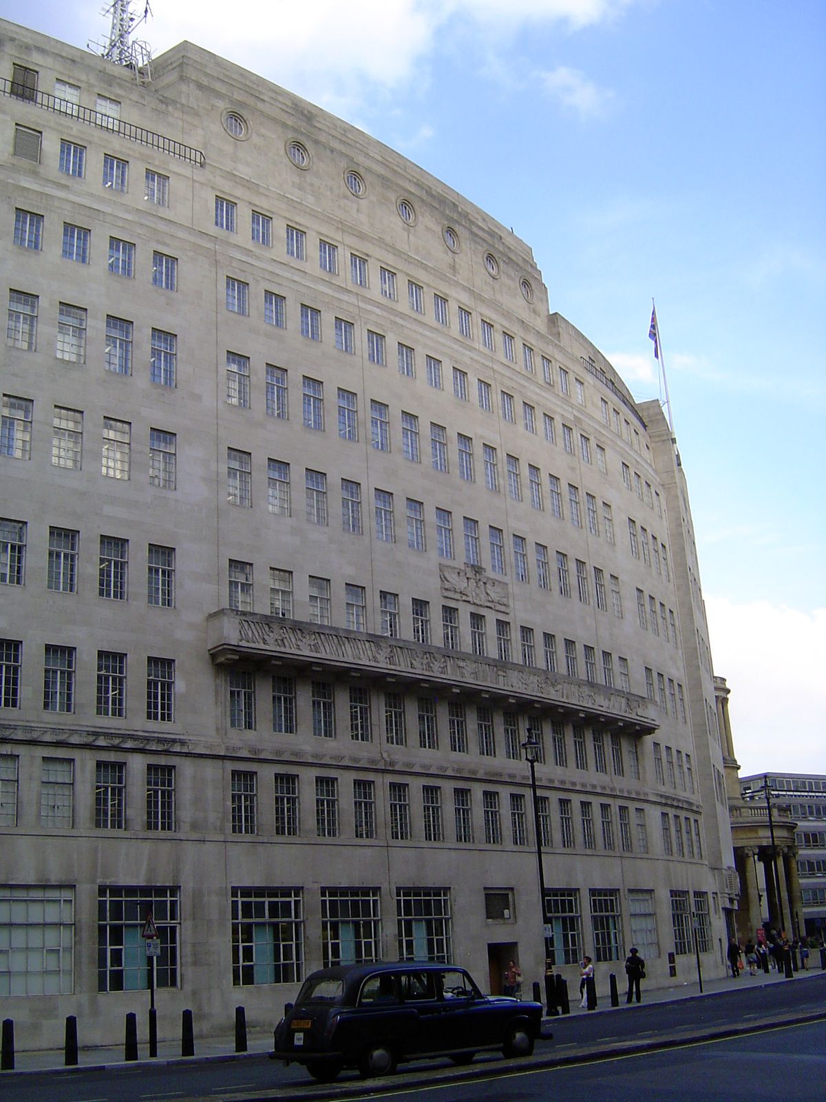 Pevsner is unkind to the architect, George Val Myer, calling the building "lumpily neutral" 3:74. The Architectural Review was much more ent
