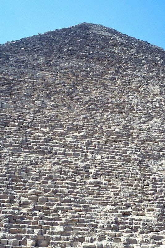 This is the biggest of them all, the pyramid of Khufu Cheops. With a side length of 750 feet and a height of 450, it covers 13 football fiel