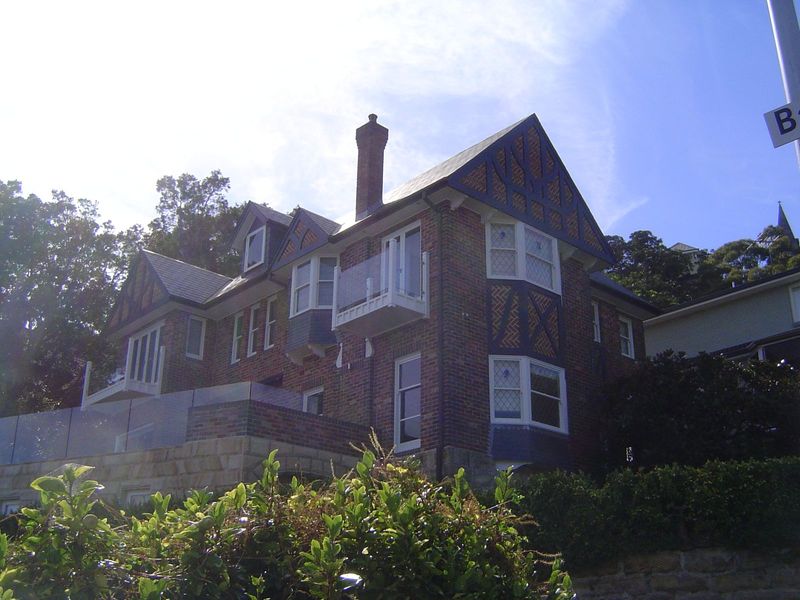 Here, from the same spot, is one of the older suburban homes built to take advantage of the view 4 Bayview Hill Road.