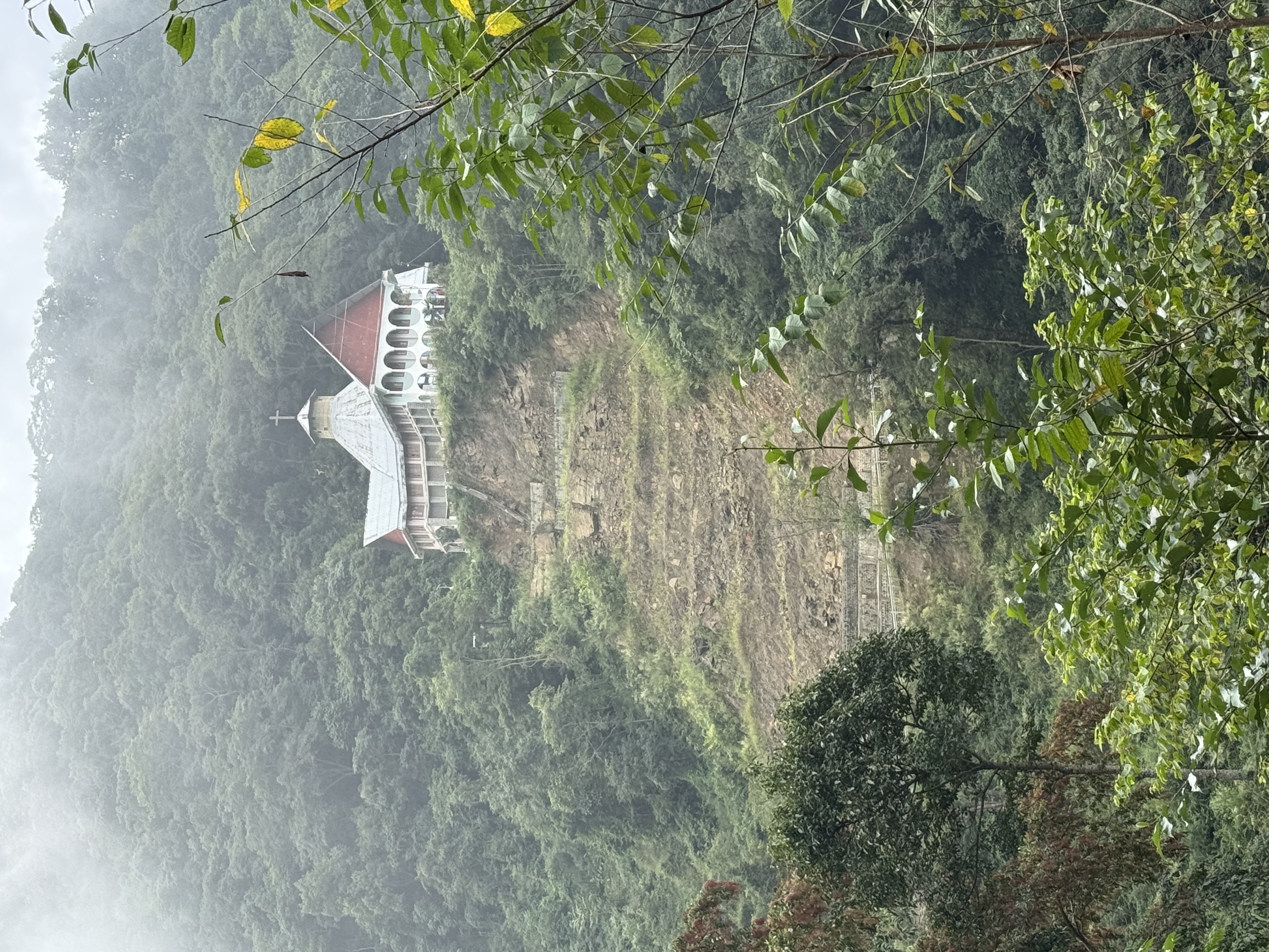 It's Saint John the Evangelist Church, a Catholic chuch precariously surviving at the top of a recent landslide.