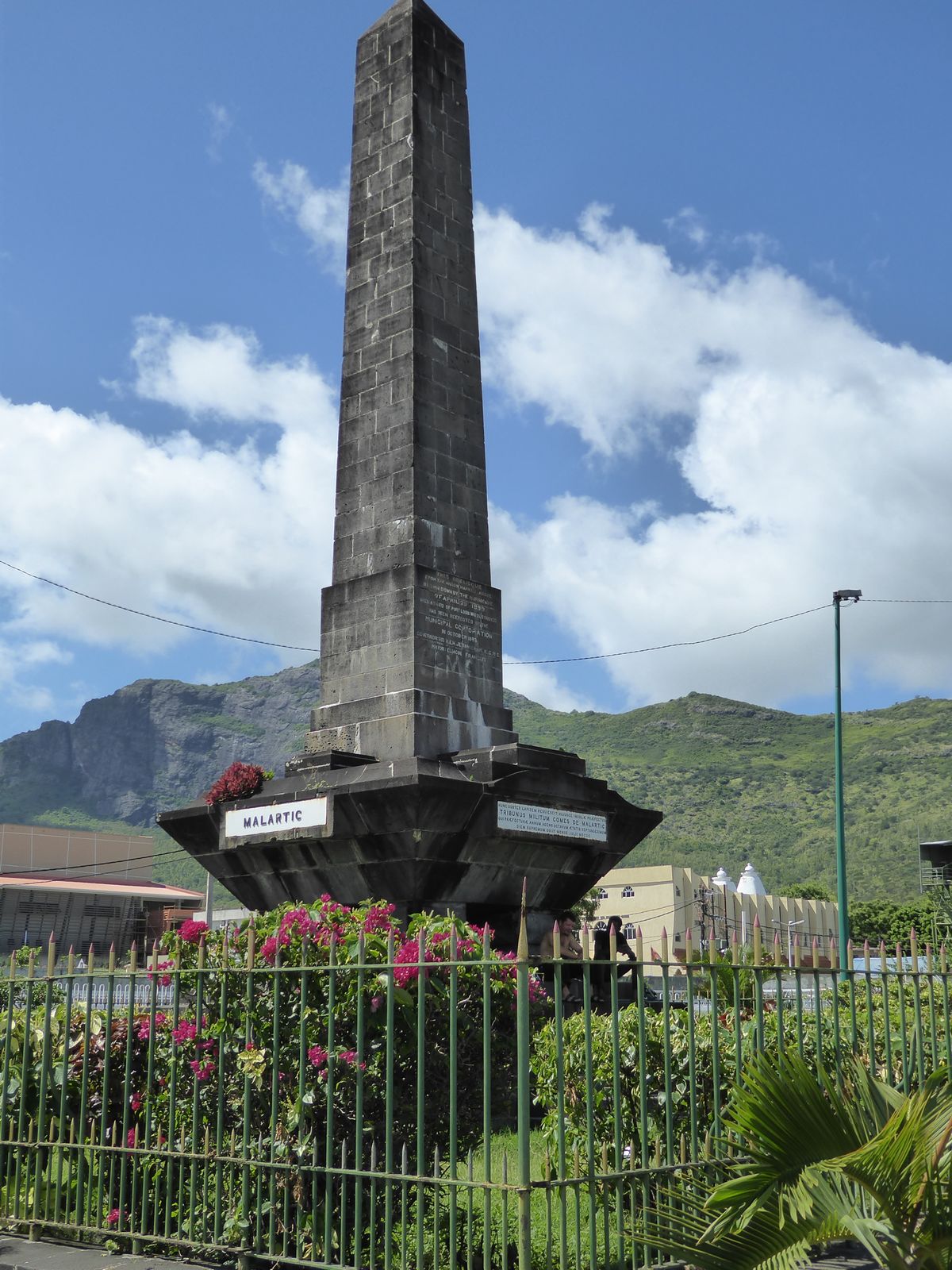 Edward shares the grounds with a monument to Count Malartic, the penultimate French governor 1792-1800. Old photos show the obelisk lying on
