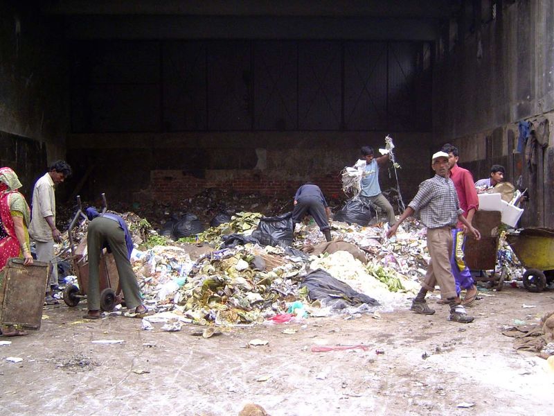 A scene that official India would sooner not show: a garbage sorting and transfer station.