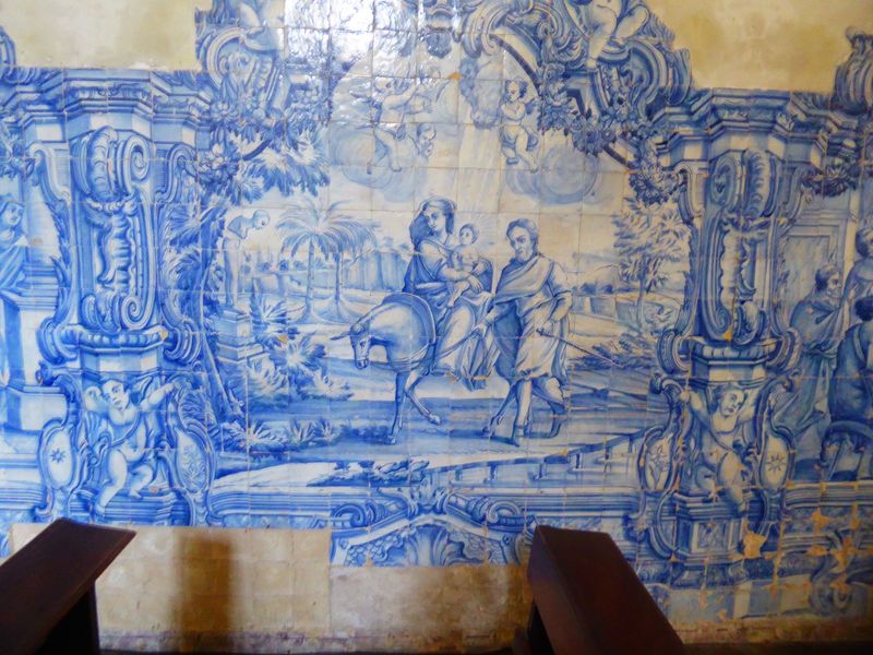 The tiles generally are allegorical or, as in this case, tell biblical stories.