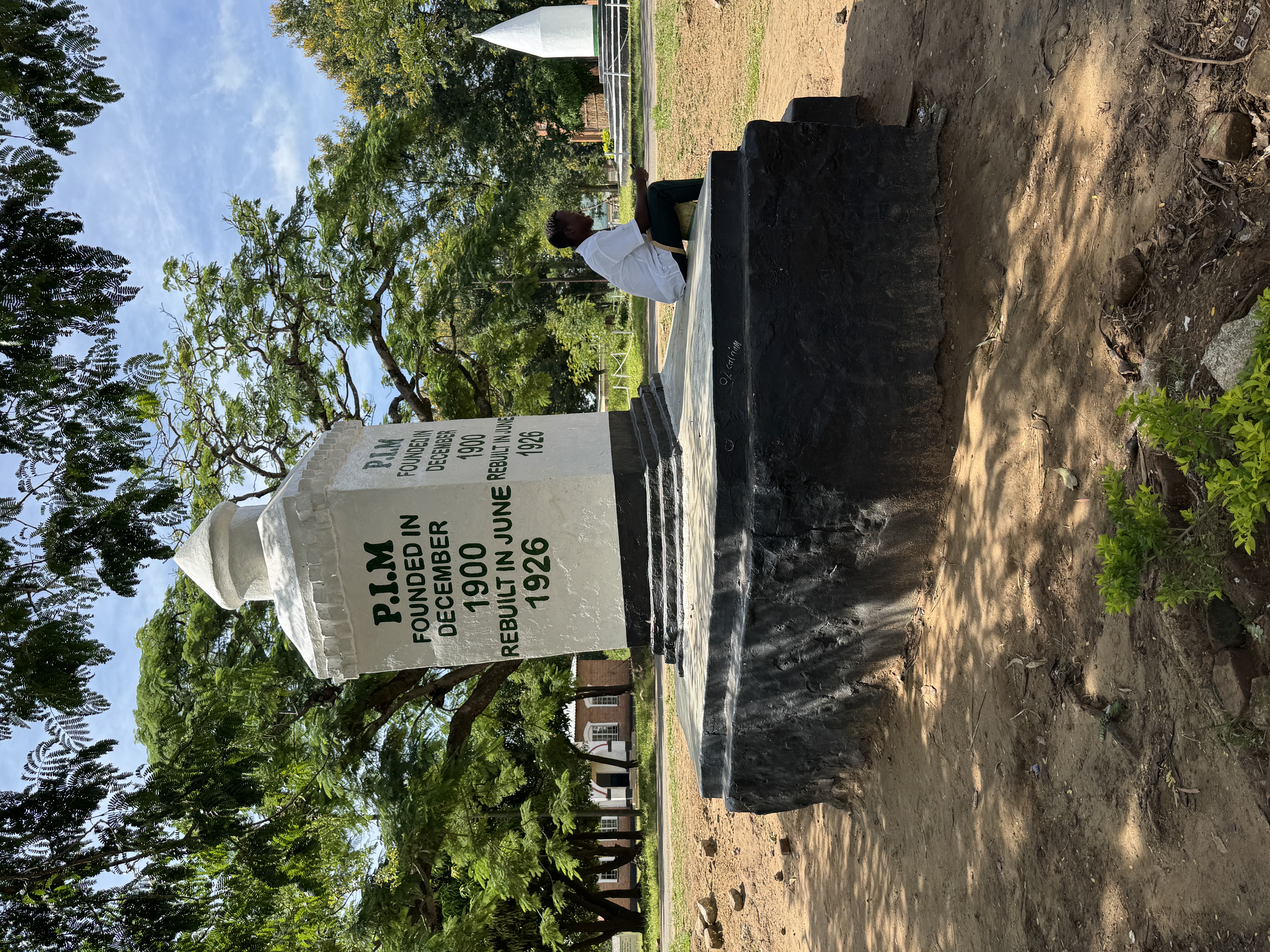 Booth came home, a certified Baptist preacher, in 1900.  The monument alludes to the fact that Chilembwe 15 years later organized a revolt. 