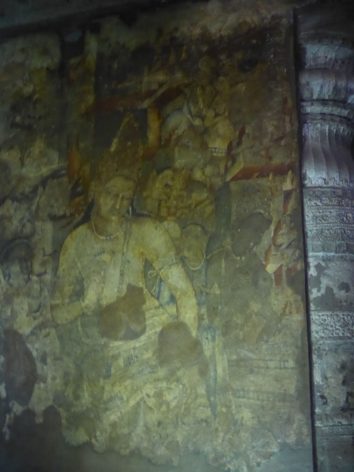 The figure on the right is probably the most reproduced painting at Ajanta, but its identity is unclear. Many guides identify the figure as 
