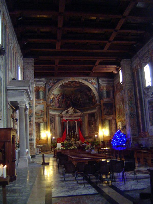The interior is the early-church form called a basilica. The cheeky comparison would be to a shoebox. In this case the shoebox has been rewo