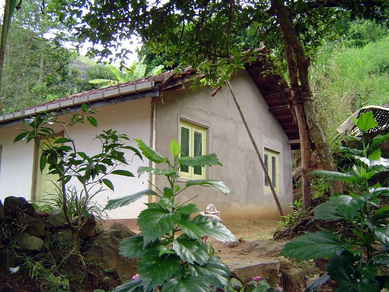 Despite the lack of roads, some of the families here have substantial homes.