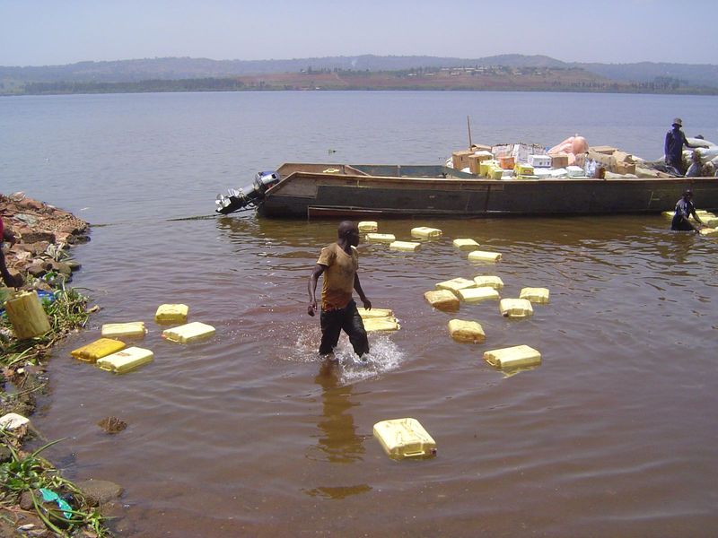 Try palm oil. It's tossed into the lake, floated over to a motorized canoe, then loaded.