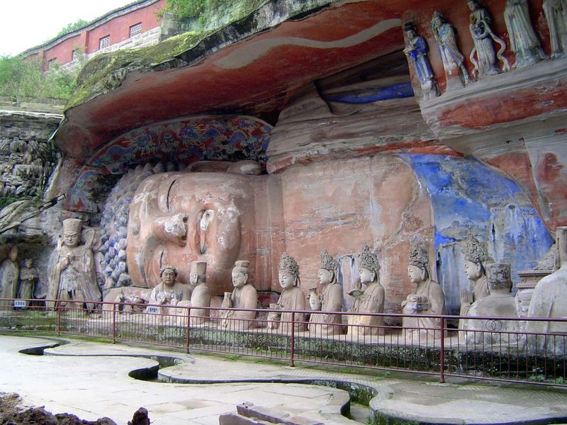At the head of the box canyon is a giant representation of Sakyamuni Buddha entering Nirvana. Sakyamuni is the earthly form of Vairocana, th