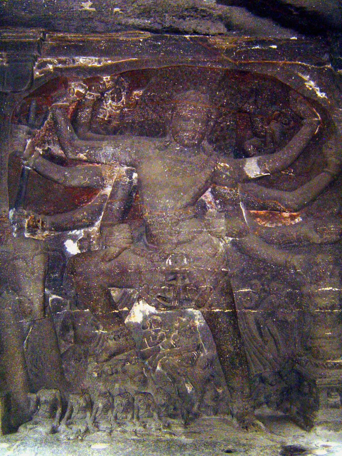 Andhakasura-vadha-murti Shiva, or Shiva as Bhairava, destroyer of evil, represented by the elephant demon. Shiva at the same time caresses P
