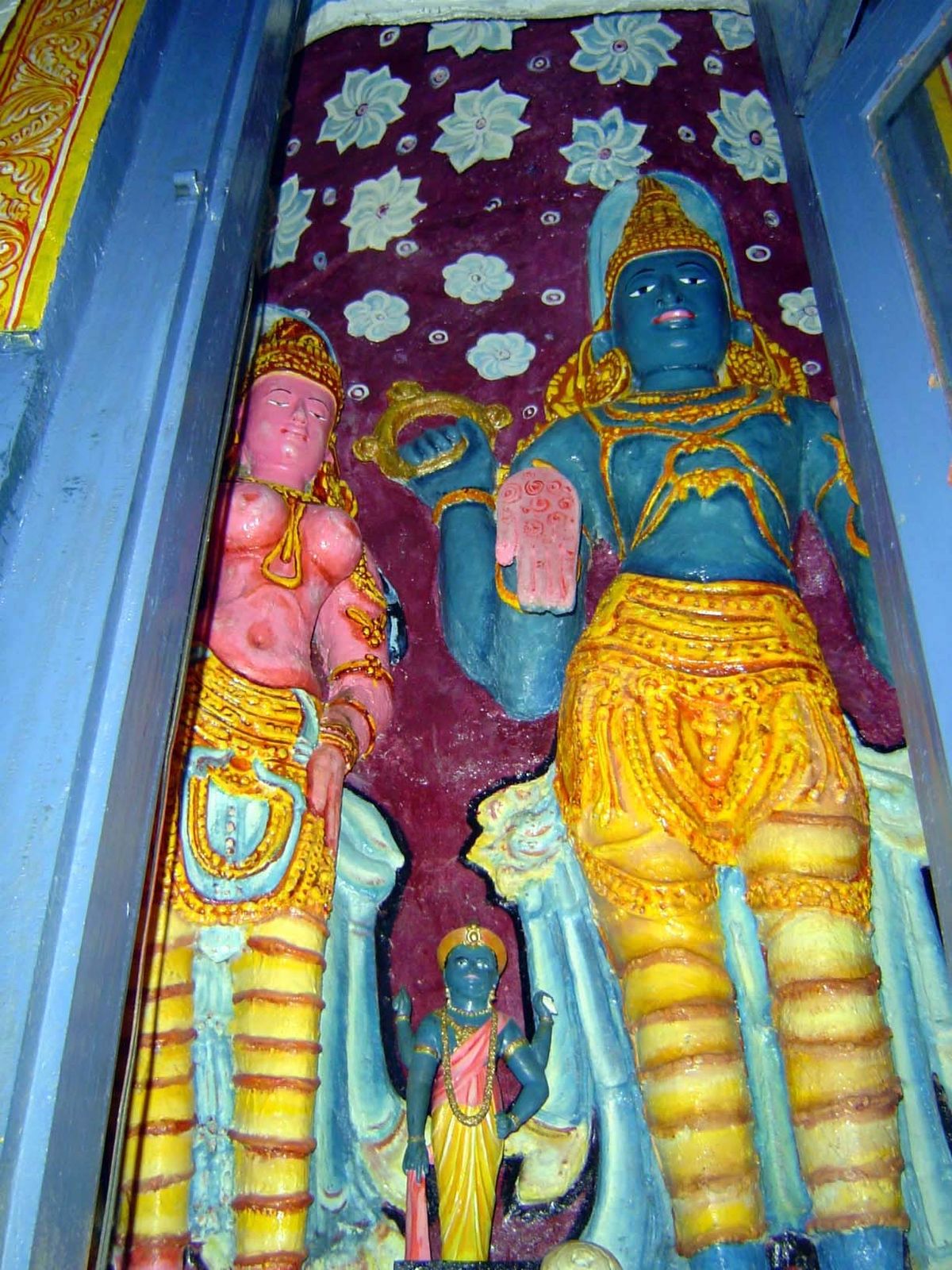 Vishnu, to whom the entire divale is dedicated, is behind the blue doors.