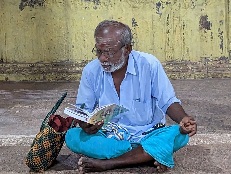 Some relief: just outside the Shiva as Adi Kumbeshwarar shrine, a man chants from the Tevaram, sacred poem from the  7th and 8th centuries. 