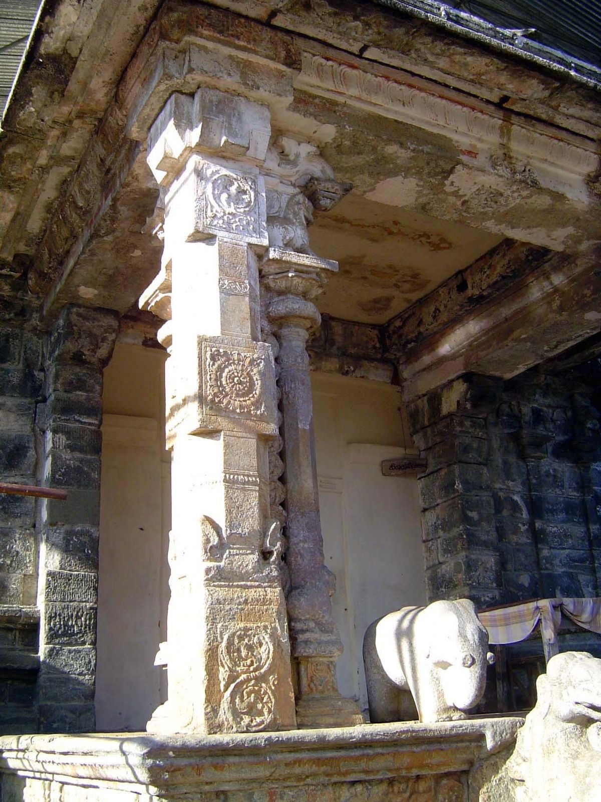 One of the two massive columns supporting the porch. It's more complex when viewed from the other side.