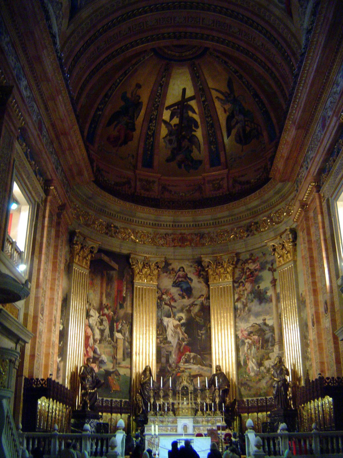 The main chapel, with an altarpiece painted by Goya, is here brightly but briefly lit for a tour group.