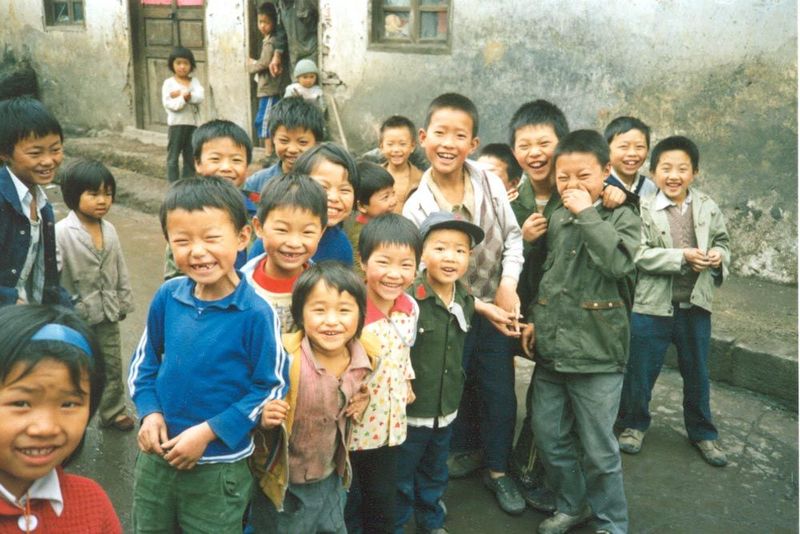 Compared to coastal China, Zhenxiong town was remote and poor, but the kids seemed happy.