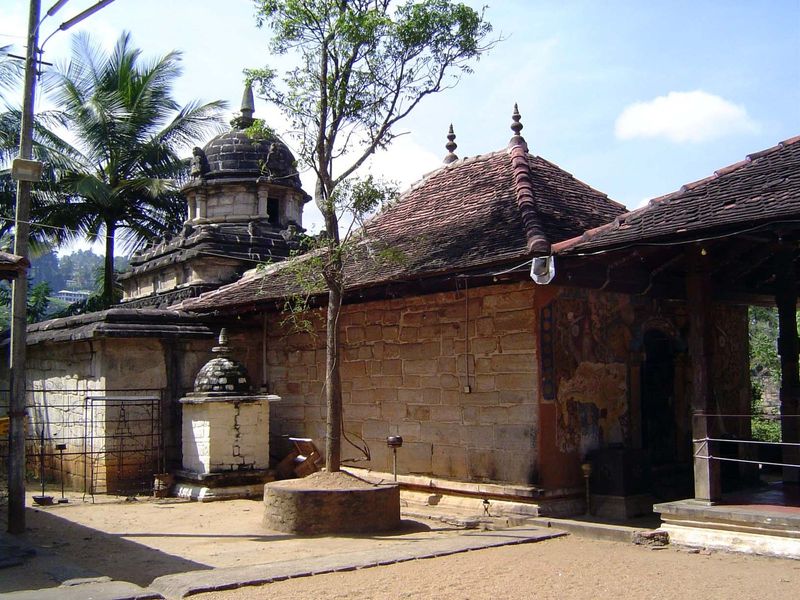 The same temple from the other side of the wall. The Sinhalese fondness for tiled roofs is defensible on the purely functional grounds that 