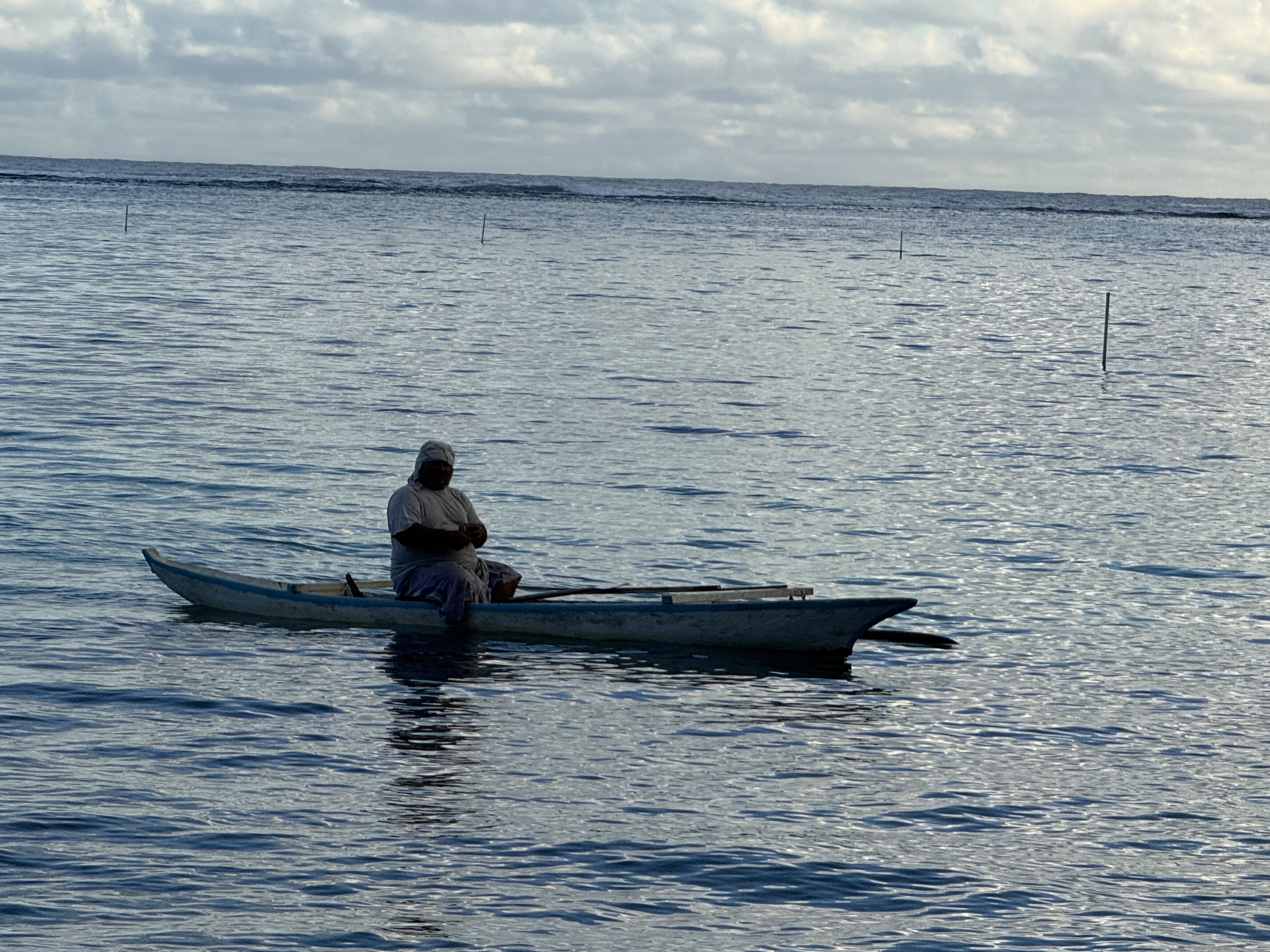 Or we could come for peace and quiet near Lafaga Bay.  Note the calm waters, for which that subdued coral reef can take credit.  Note also t
