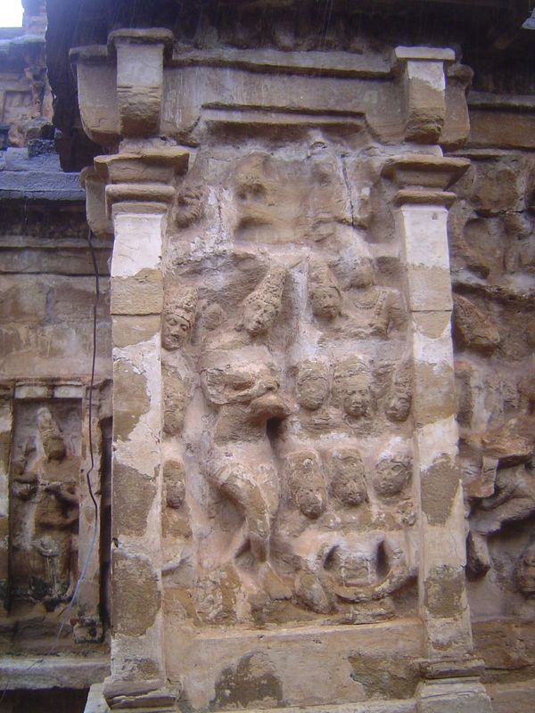 At the inauspicious southwest corner, Mohini serves amrita, the nectar of immortality, to the devas. On the left, envious asuras or anti-dev