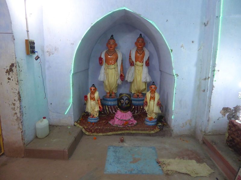 Inside, there's a shrine with brutally lit and crude images of Chaitanya Mahaprabhu, the founder of Gaudiya Vaishnavism, and his disciple Ni