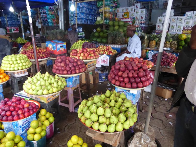 We're at the Maitama farmer's market, which is a lot more fun than Shoprite but does raise questions. Pears? Apples? Plums? Grapes? In the t