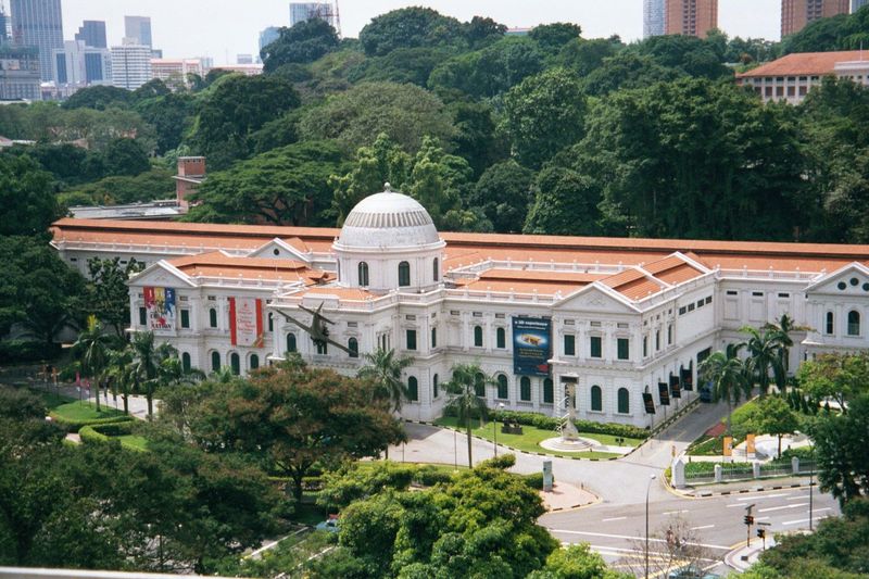 The National Museum, built for Victoria's Diamond Jubilee; behind it, Fort Canning Park.
