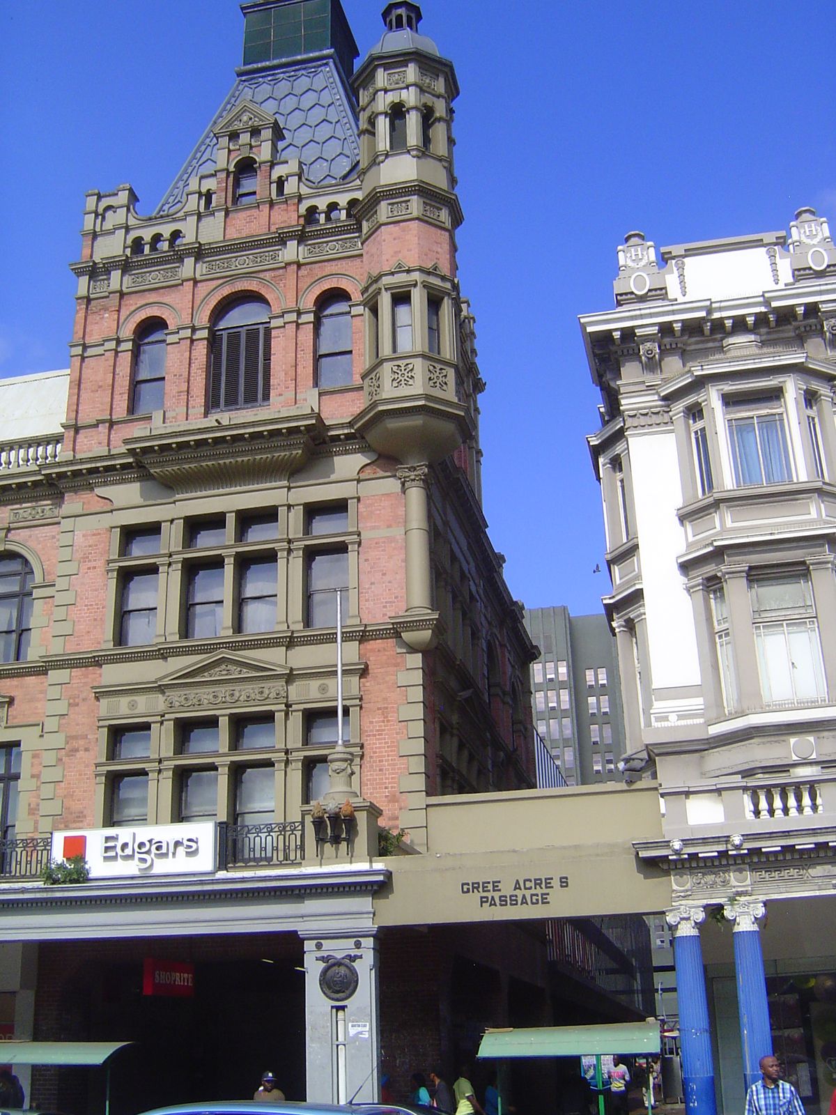 Only the facade survives; in 1980 the interior was gutted. You can see the new building if you peek down the alley.