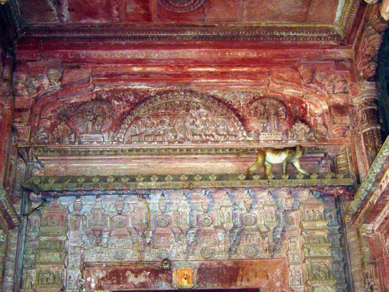 Lintel over the shrine; the monkey belongs to a troop that can be a nuisance.