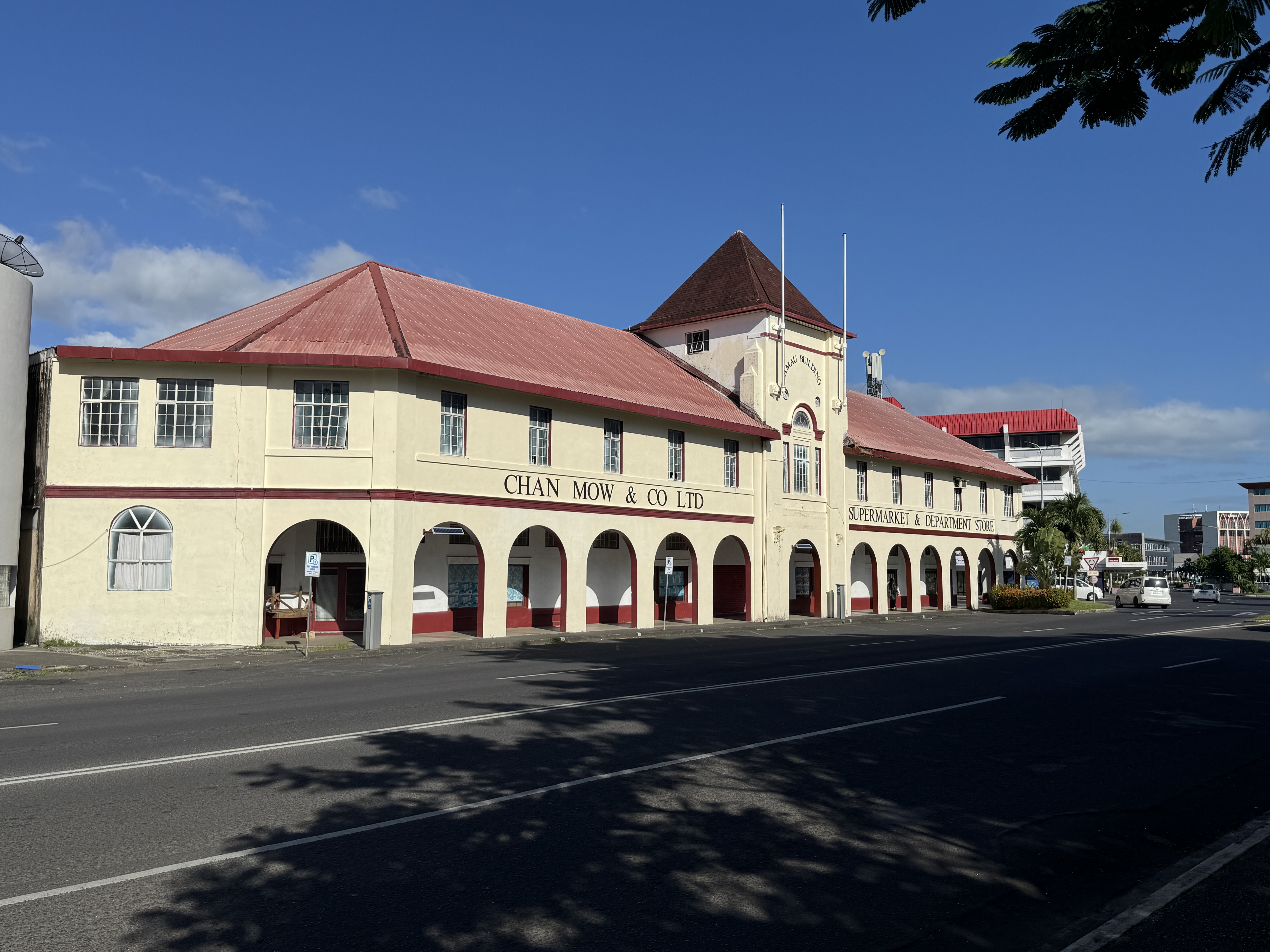 You can't miss National Provident's roof.  Next to it is the Amau Building, from 1932.  The Chan Mow family, which operates several stores i