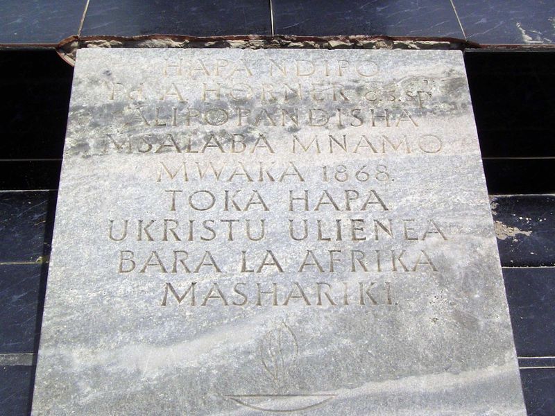 The inscription, in Swahili, says that Christianity was established here in 1868 and then spread across East Africa.