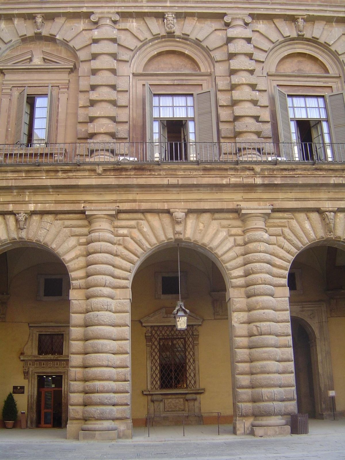 The other side of the Pitti palace faces the Boboli Gardens. The facade here is late—1568—and by an architect, Ammannati, who reduced rustic