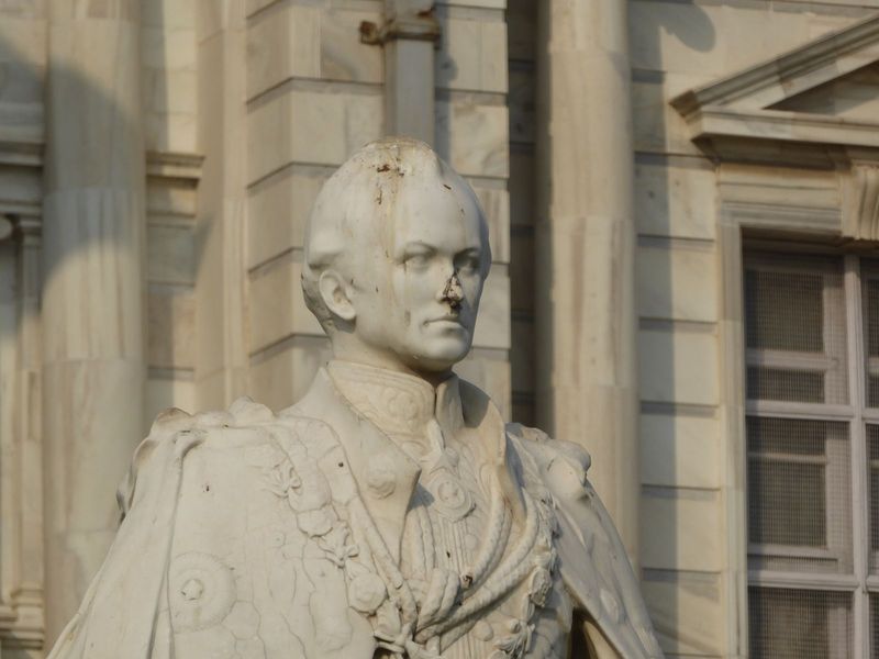 The statue, by William Frederick William Pomeroy, bears little resemblance to Curzon, apart perhaps from its stony confidence.