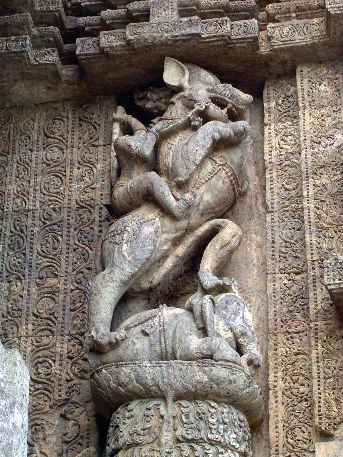 The decoration also includes mythical animals, in this case a leogryph the Sanskrit name is simply vyala, "lion," atop an elephant.