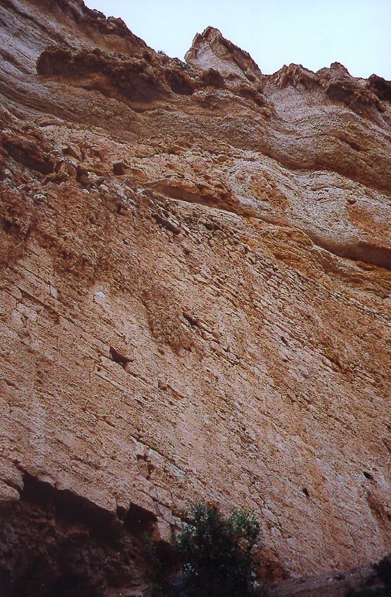 Along the south rim, a massive stone wall supports a water channel built to carry water to Jericho.