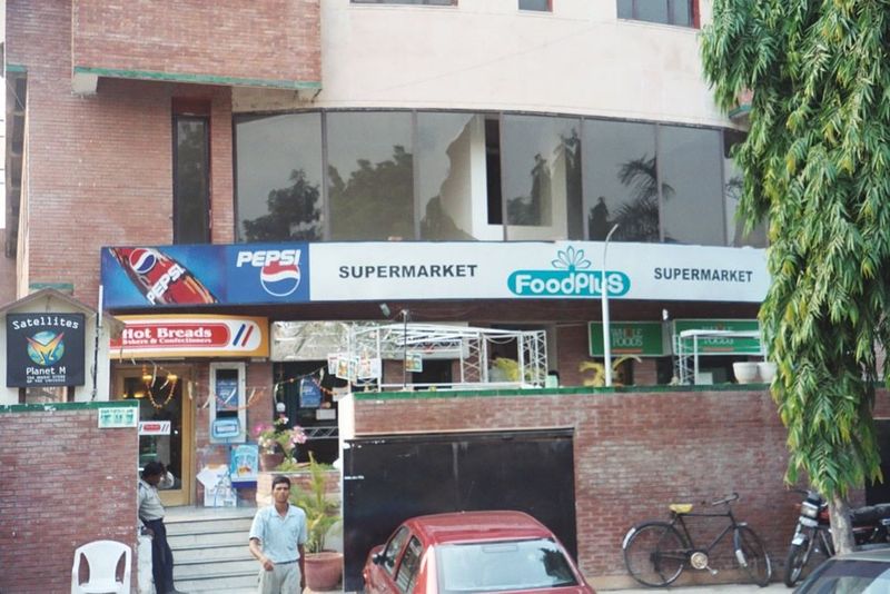 Retailing is still on a comparatively primitive level, even by Asian standards, but the icons and the language are international.