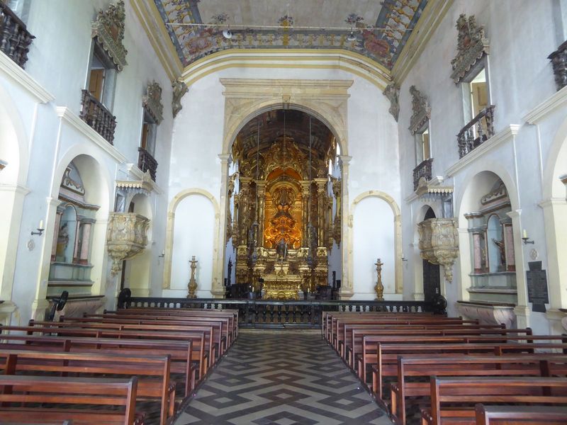 Like the Franciscan church, this one has lost its aisles and become a big box, but the altar pulses with simulated life, a bit like a scienc