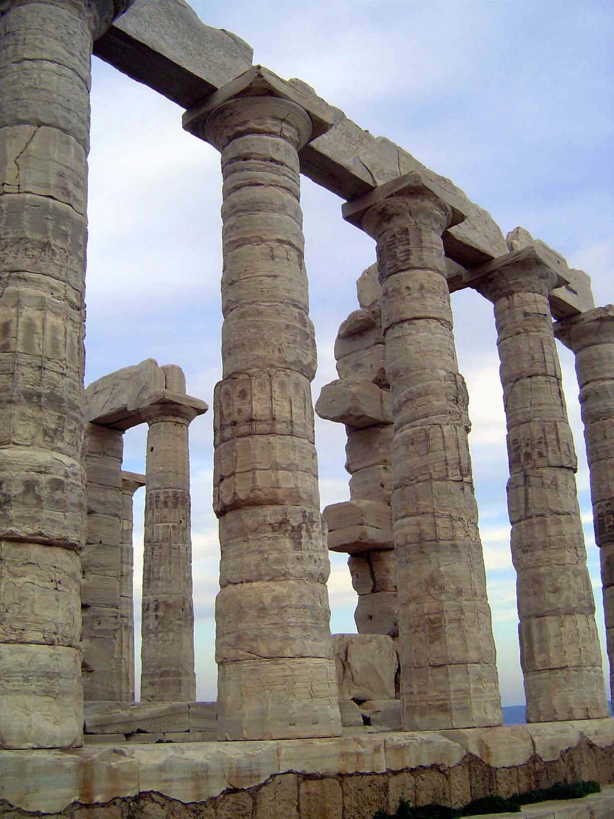 The unusally slender columns have only 16 flutes instead of the usual 20. They are not reassemblies, however: they're standing now as ever, 
