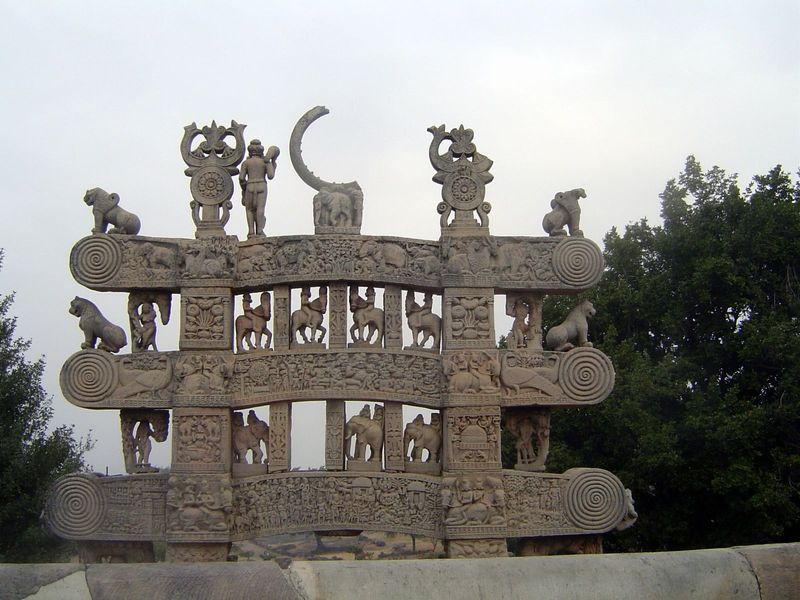 Here we look at the rear side of the north gateway. There are seven freestanding figures on the top. Fragmentary as they are, they're still 
