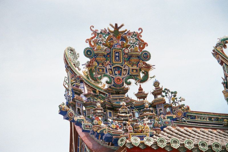Roof trim: hints of ships are common in the ornamentation, built by people who sailed across the sea to get here.