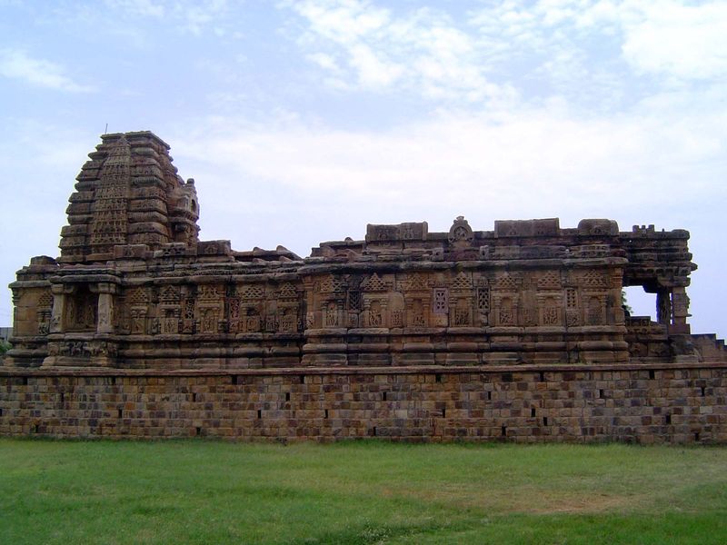 Still farther south, the Papanatha Temple, enlarged at the time of the construction of Virupaksha but with a spire in the northern style. Or