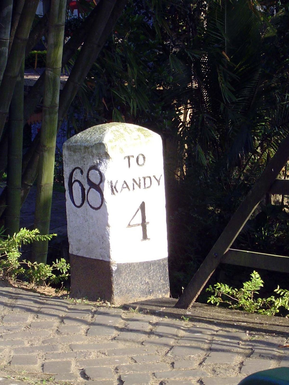 The British built roads too, of course, and in a metric age, this British milestone survives on the Colombo-Kandy road.
