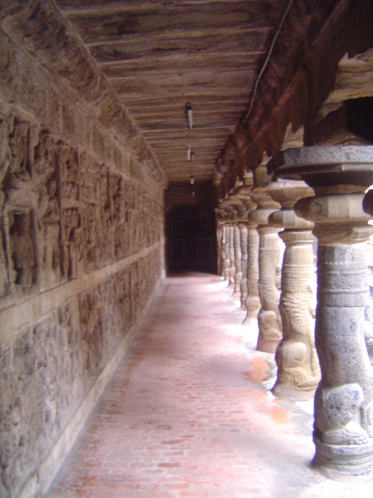 The carved wall and colonnade on the east side. Nice fluorescent tubes.