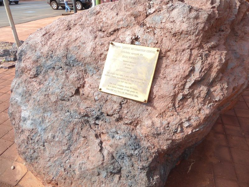 Here's a sample of what everyone's here for: it's a 35-ton chunk of banded proterozoic iron ore, about 70 percent iron. It's hard enough not